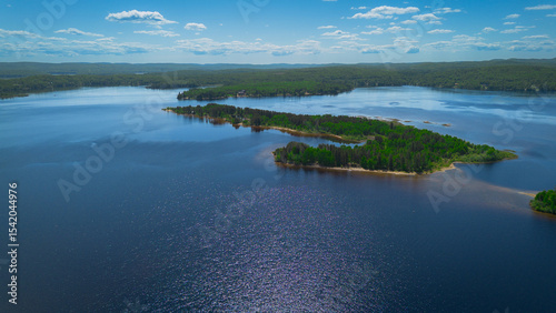 Aerial view of a large lake in the Canadian forest in Quebec in the Lanaudière region