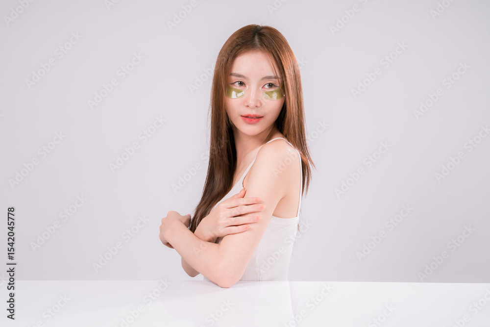 Fototapeta premium Skin Care Woman Asian Person Smile White Beauty Young Portrait Face Background, Confident and Radiant Female Model with Healthy Skin On White Background