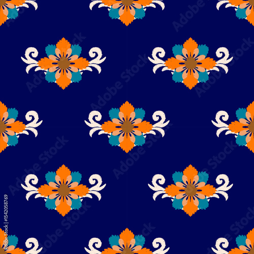 Motif ethnic seamless floral ikat pattern The orange and blue flowers on navy background 