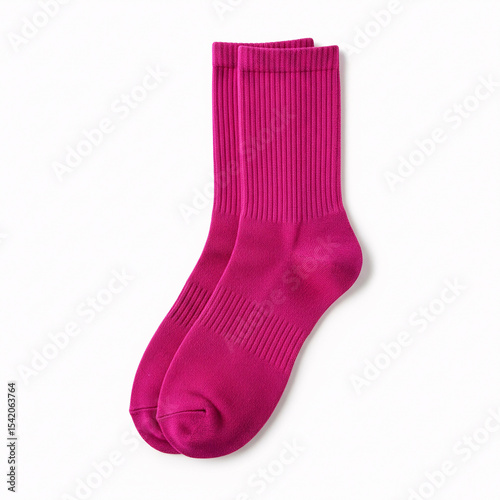 Pink socks isolated on white background Top view.