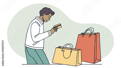 A person with credit card looking at shopping bags after making purchases in a retail environment