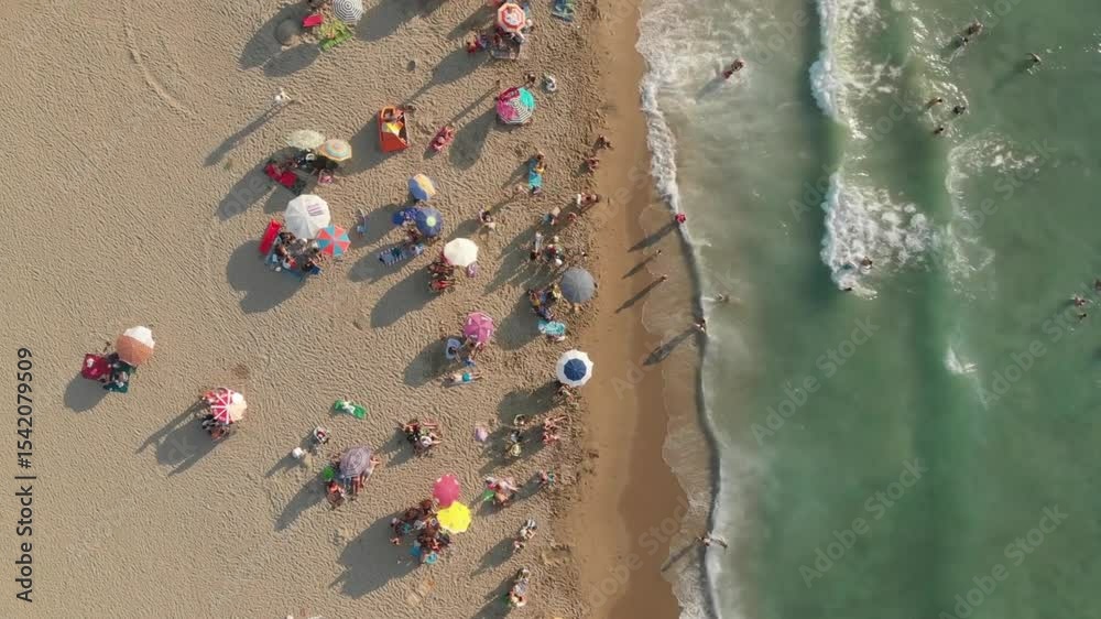 Aerial View of Crowded Beach with Ocean Waves Aerial View of Crowded Beach with Ocean Waves