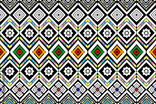 Abstract geometric design of ethnic rugs, fabric, clothing, rugs, vector illustrations, embroidery style, seamless, and wallpaper.