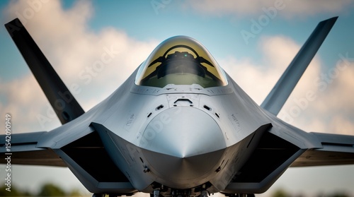 Jet Aircraft Close-Up Against Cloudy Sky