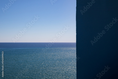Fototapeta Naklejka Na Ścianę i Meble -  Shades and shapes of blue. wall, sky and sea