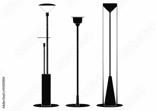 Three modern street light pole silhouettes