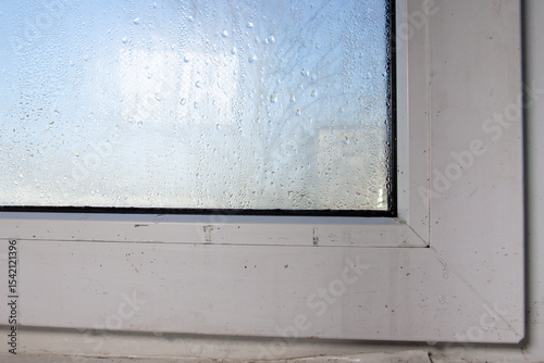 fogged glass. drops of water on the window