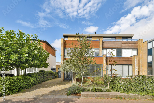 Modern Residential Building Surrounded by Greenery photo