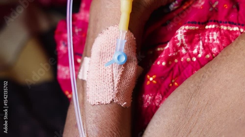 close-up of medical cannula in hand in hospital setting