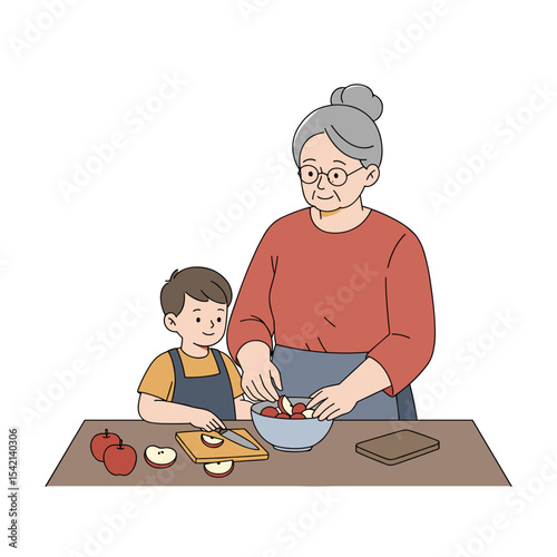 Senior woman and young boy preparing apples at the kitchen table with a white background