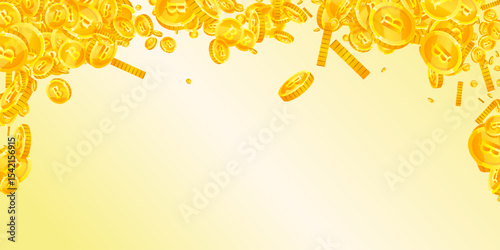 Thai baht coins falling. Gold scattered THB