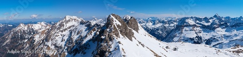 View from the Nebelhorn mountain summit over the Hindelang via ferrata and to the Hochvogel summit