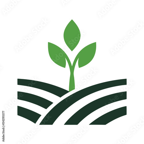 Green Plant Sprouting from Dark Green Rolling Hills Field