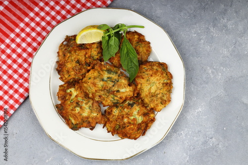 Mucver, Turkish traditional food. (Turkish cuisine) Homemade Food with Zucchini.