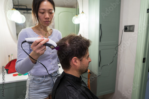 Couple enjoys ritual at home as they engage in a DIY haircut session