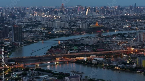 Night hyperlapse of Luanda Bay, featuring vibrant city lights reflecting on the water, illuminated buildings, and dynamic traffic. Perfect for urban, cityscape, or African city projects