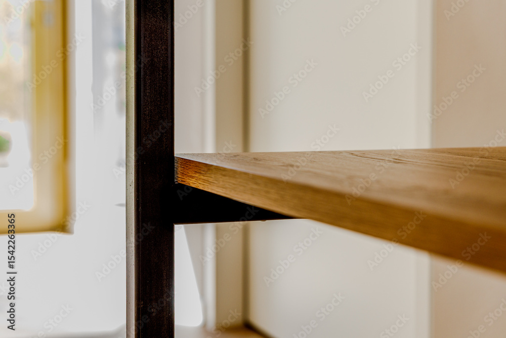Fototapeta premium Close-Up of Metal Shelf with Wooden Boards in Minimal Corner
