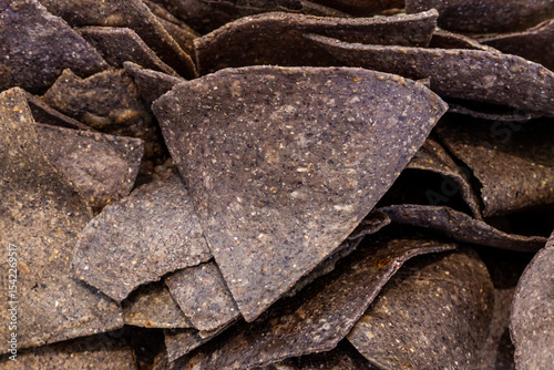 Blue corn tortilla chips rich texture in close-up
