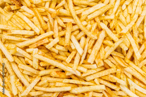 Crisp golden french fries texture in close-up