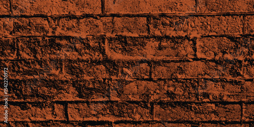 Reddish-brown-scale image of a building exterior, highlighting intricate patterns and shadows cast on its textured walls with a gradient.
