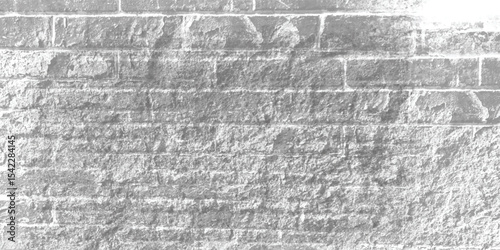 Deeply weathered and pitted stone wall, showing the erosion caused by years of exposure to environmental elements.
