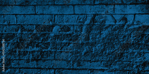 Detailed surface of an old retaining wall, revealing marks of age and a pervasive, atmospheric blue hue.
