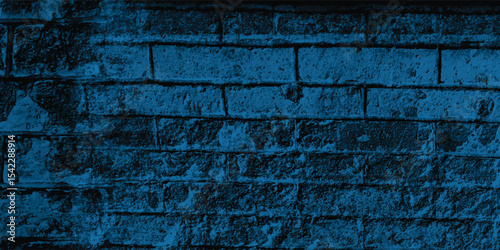 Detailed surface of an old retaining wall, revealing marks of age and a pervasive, atmospheric blue hue.
