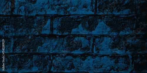Deeply weathered and pitted stone wall, showing erosion and a rich blue saturation from artistic rendering.
