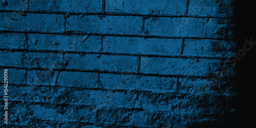 Aged and cracked wall surface in a deep blue, offering a detailed study of material degradation and natural wear.
