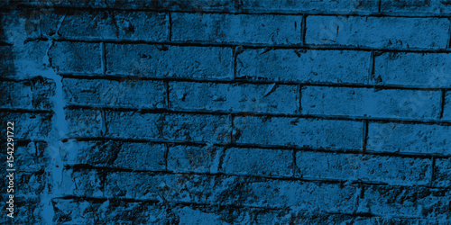 Vertical and horizontal lines of a textured blue wall, creating a strong sense of structure and orderly repetition.
