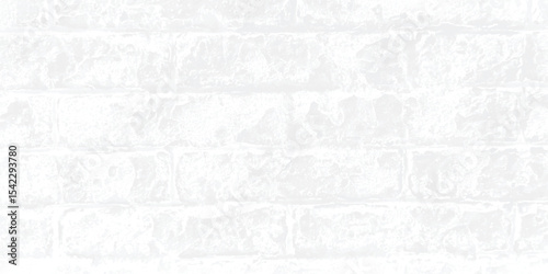 Grey-scale image of a building exterior, highlighting the intricate patterns and shadows cast on its textured walls.
