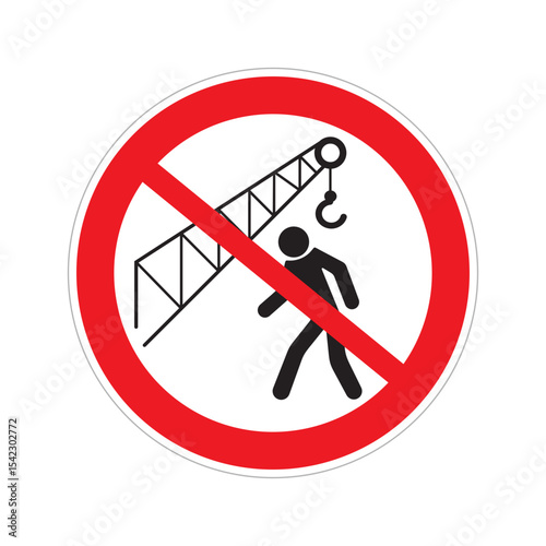 A warning sign is displayed prominently at a construction site, alerting individuals to stay clear of crane operations and overhead lifting activities for safety
