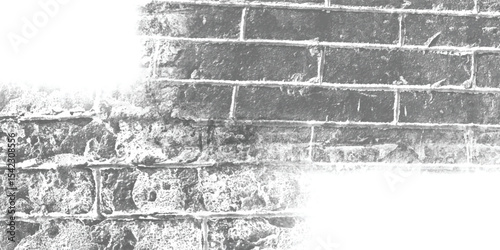 Vertical and horizontal lines of a textured wall, creating a strong sense of structure and orderly repetition.
