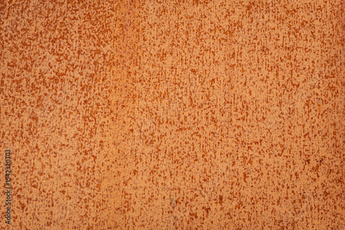 Red rust on a metal sheet.