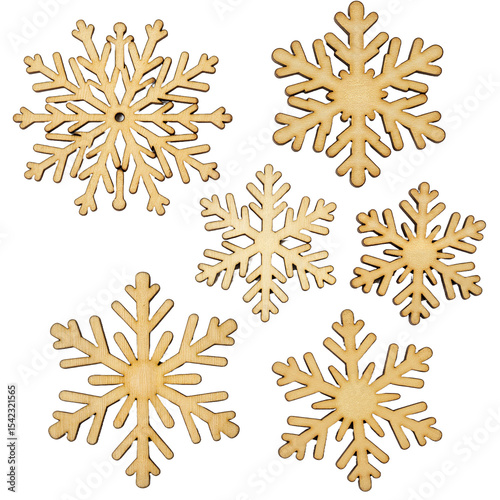 Decorative wooden snowflakes on a white background for holidays  