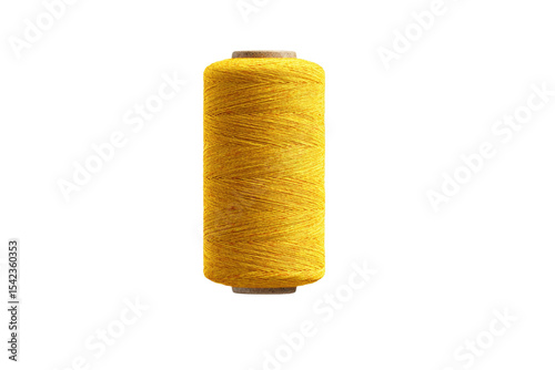 A yellow spool of thread is sitting on a white background