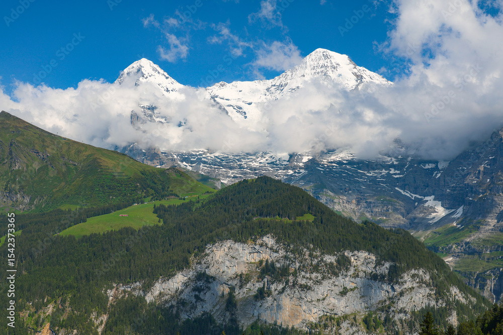 Fototapeta premium Eiger peak (3967m) surrounded by stormy clouds , Berner Oberland, Switzerland, Europe 