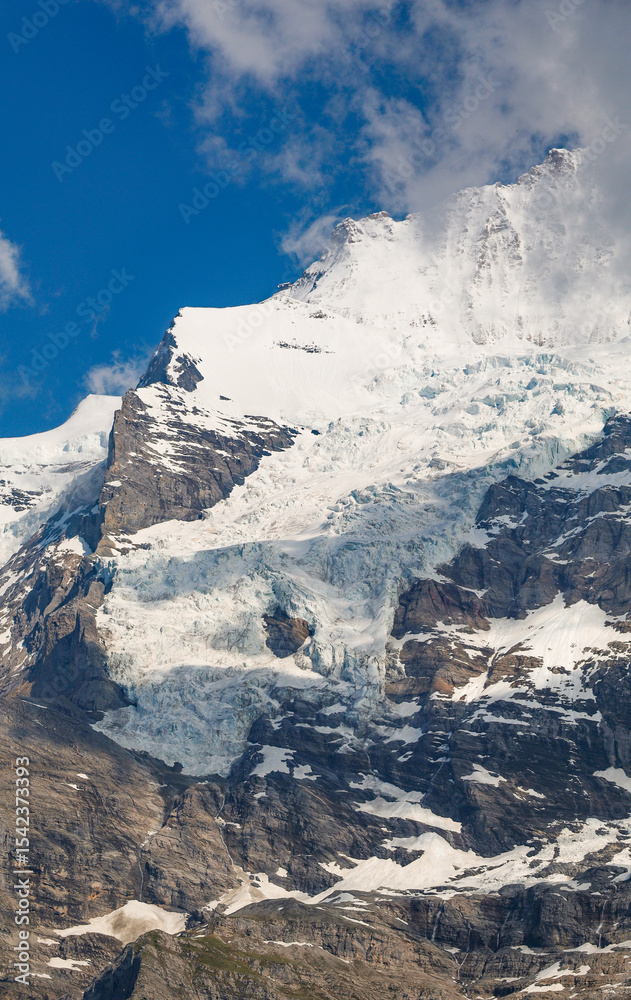 Obraz premium Eiger peak (3967m) surrounded by stormy clouds , Berner Oberland, Switzerland, Europe 