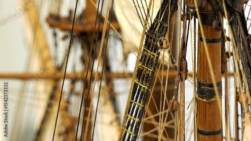 Handmade ship masts close up on white background