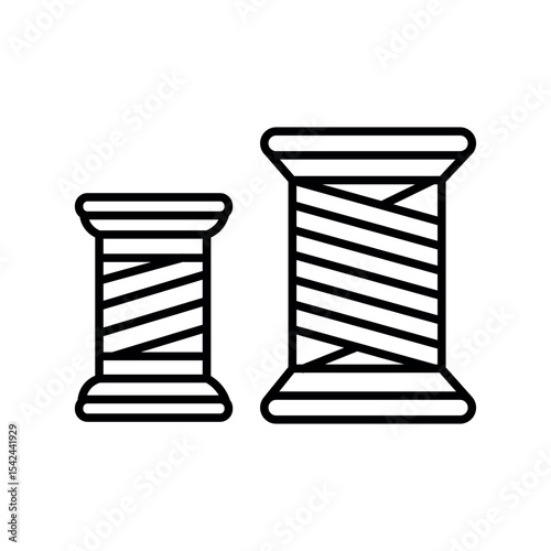 Two spools of thread sewing craft supplies