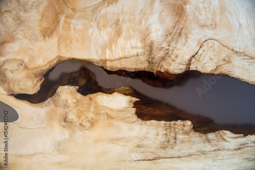 Live edge burl wood slab with epoxy resin river