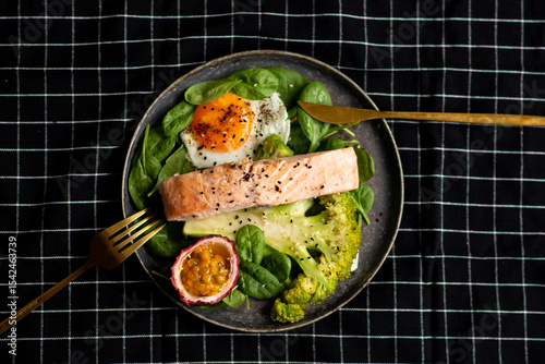 Baked or fried salmon and salad, Paleo, keto, fodmap, dash diet. Mediterranean food with steamed fish.