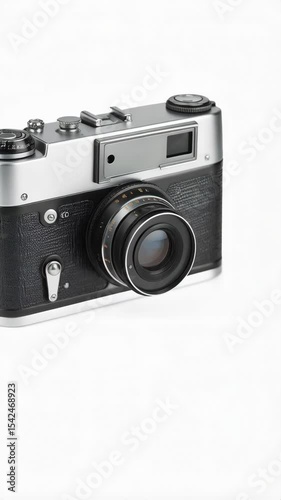 Classic rangefinder camera features a silver and black body with a fixed lens, vintage photography equipment for art and journalism.