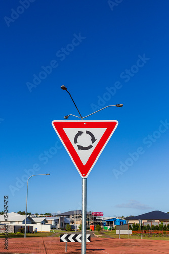 Round about give way sign
