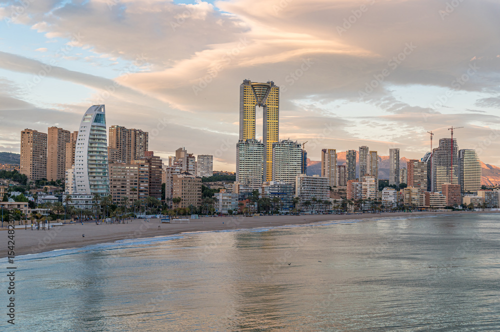 Fototapeta premium Sunset view of modern buildings in front of Poniente Beach in Benidorm, Spain