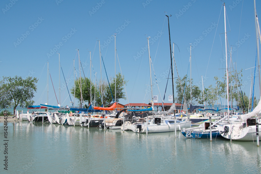 Obraz premium yacht club with boats and yachts on Lake Balaton in Hungary. Yachts moored in a marina on the lake