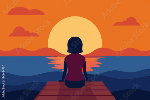 A woman's silhouette in a peaceful yoga meditation pose on the beach at sunset