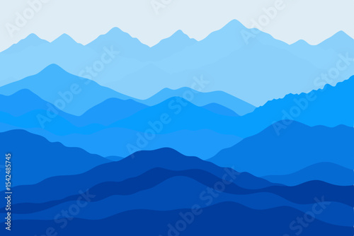 Mist-kissed peaks pierce the blue morning sky, revealing a serene mountain landscape veiled in fog