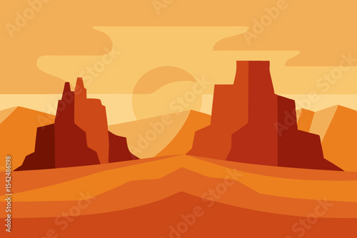 Desert landscape with towering sandstone buttes in Monument Valley, Arizona at sunset