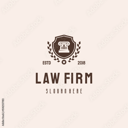 Formal law firm  with a pillar emblem.